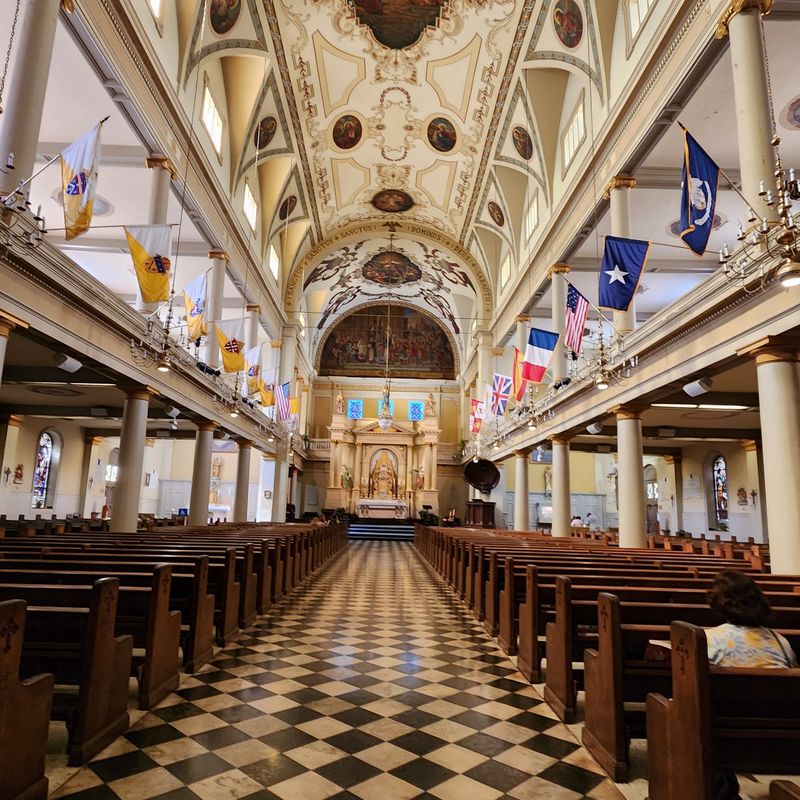 Stained Glass, Frescoes, And A Marble Altar Inside