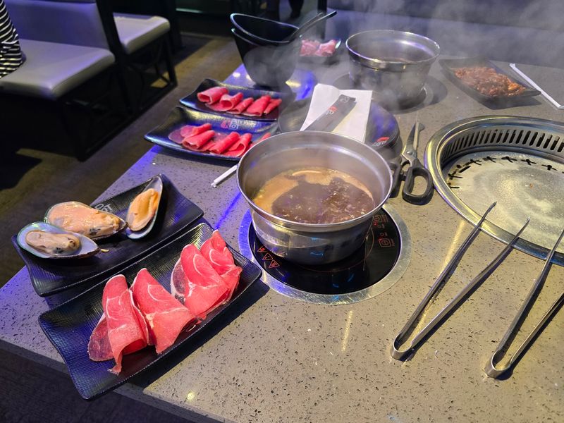 Grill And Hot Pot Together In One Table Setup