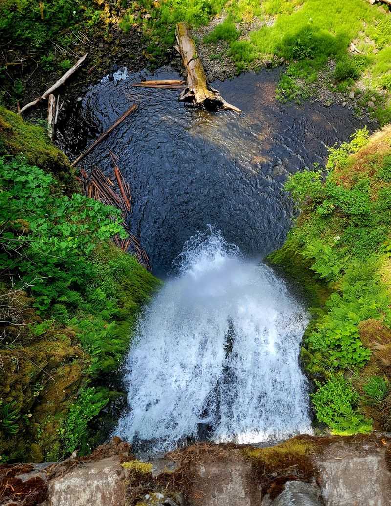 The Impressive Drop From Cliff To Creek