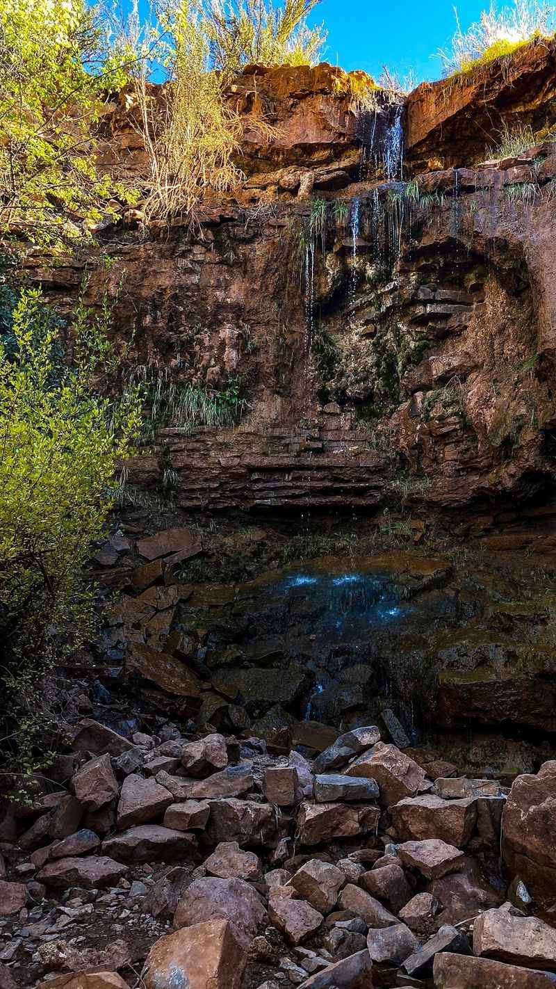 A Waterfall Cascading Over Sandstone