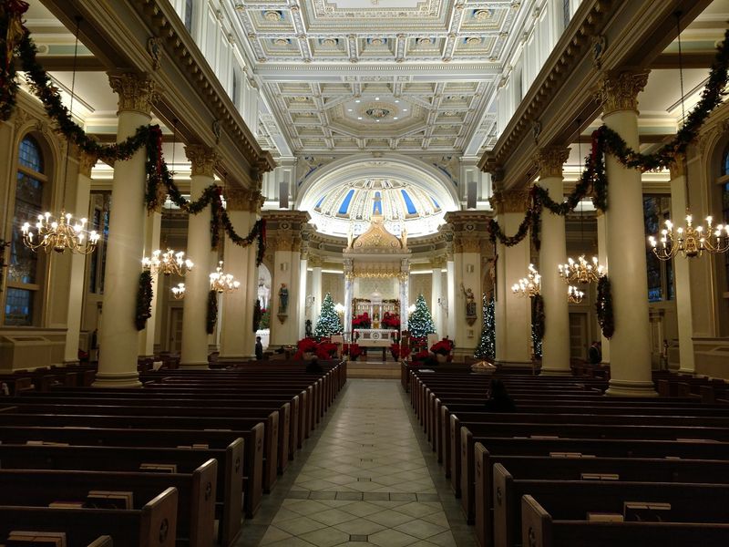 The Ornate Ceiling Above The Pews