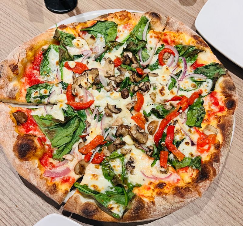 Hand-Spun Dough Gives The Brand Its Name