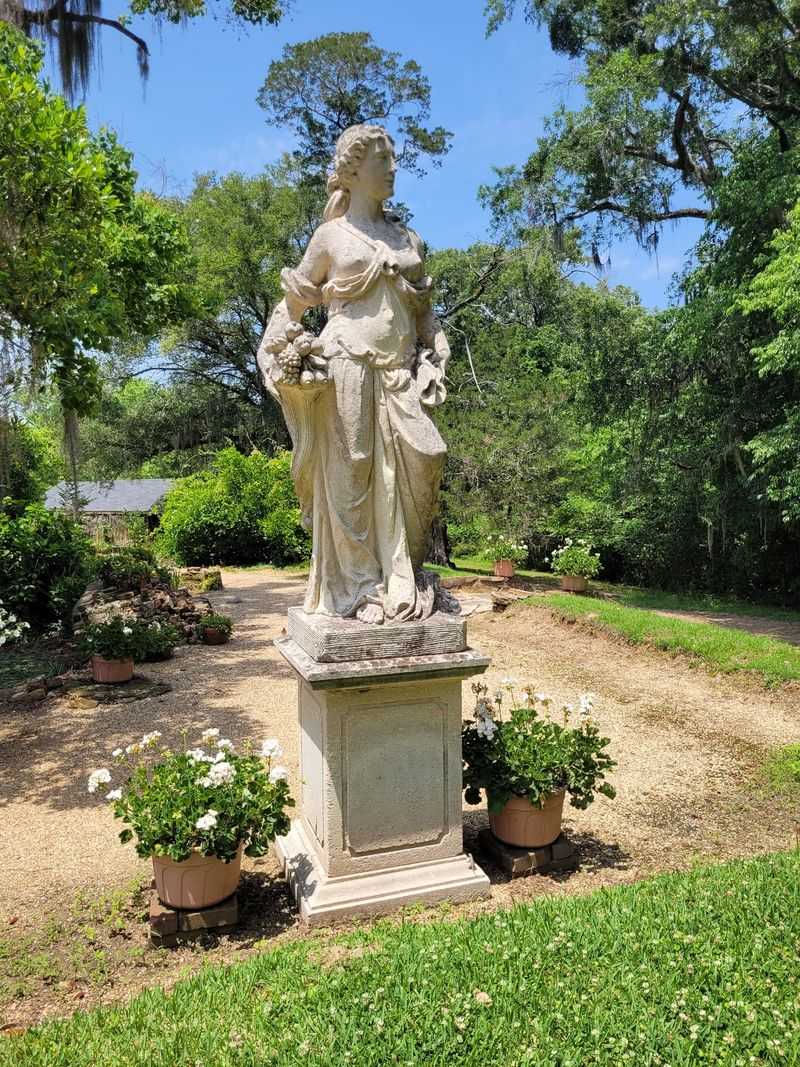 Four Silent Statues Still Guard The Front Door That Isn't There