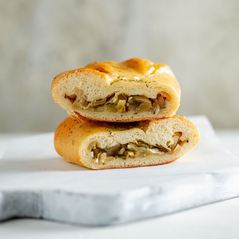 Golden Hand Pies Filled With Beef, Cheese, Potatoes, And Hearty Flavors