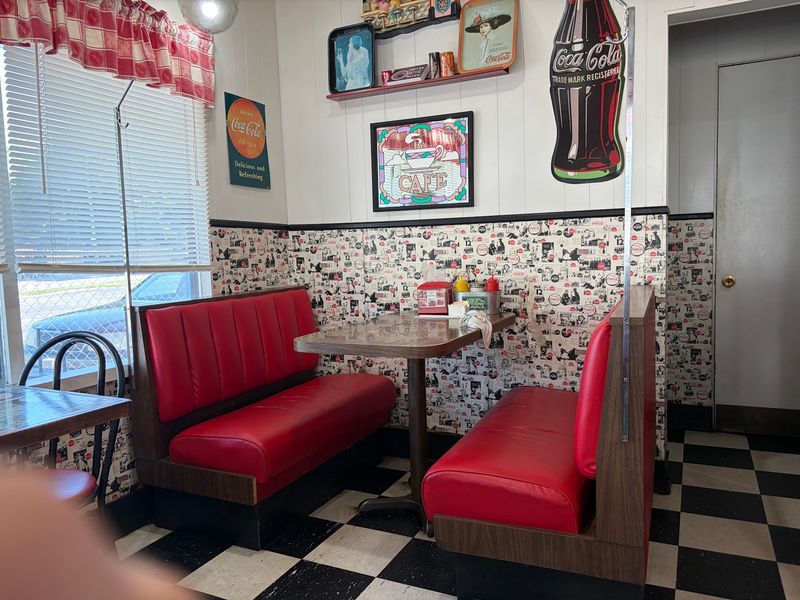 Red Booths, Checkered Floors, And Coca-Cola Everywhere