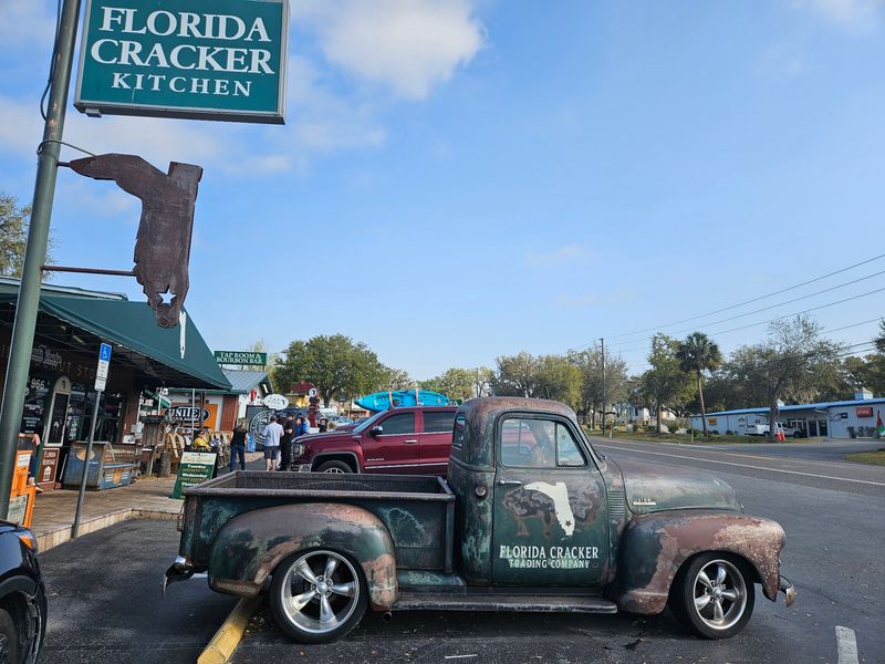 Gift Shop Browsing, Patio Seating, and Classic Cars