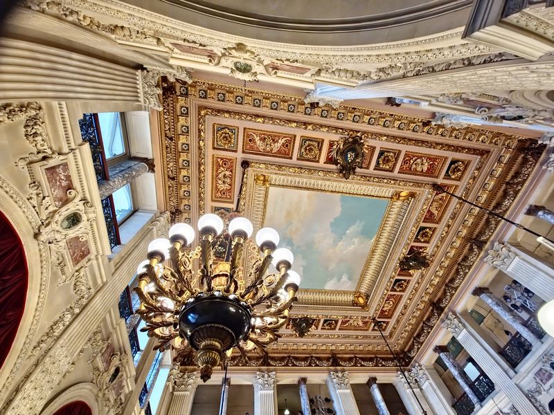 Dinner Here Came With Chandeliers And A Goddess Overhead