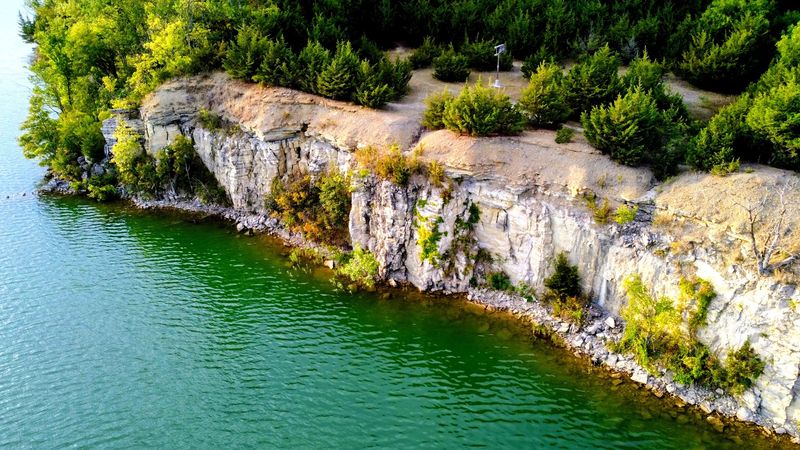 Those Cliffs Drop Straight Into Water Clear Enough To Stare At