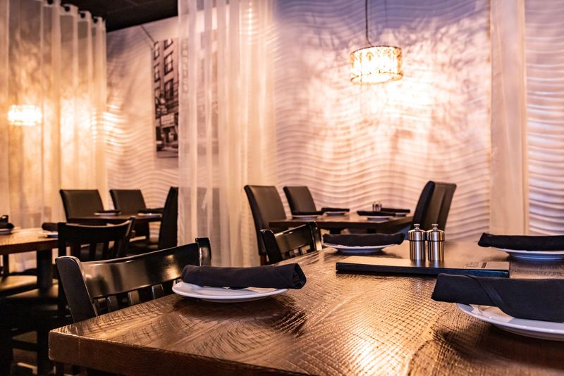 A Clubby Steakhouse Sits Where You'd Least Expect One
