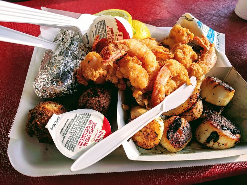 Baskets Piled With Shrimp, Scallops and Hush Puppies