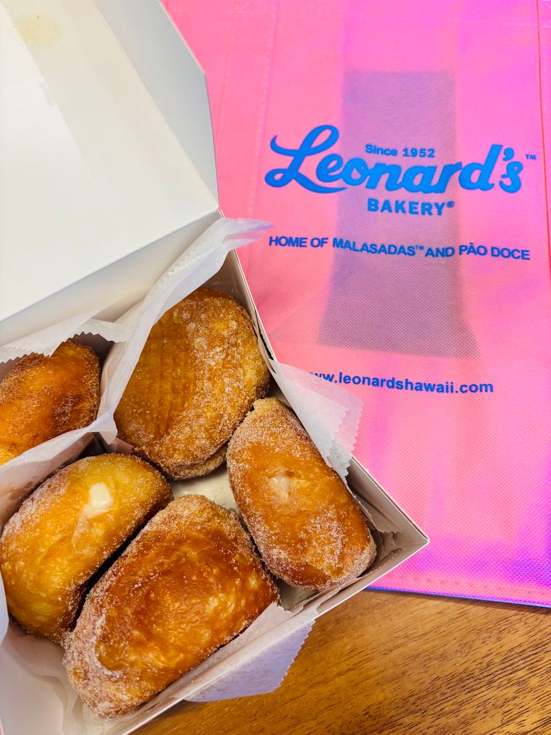 The Golden Sugar Coating And Fluffy Dough That Make These Malasadas Special