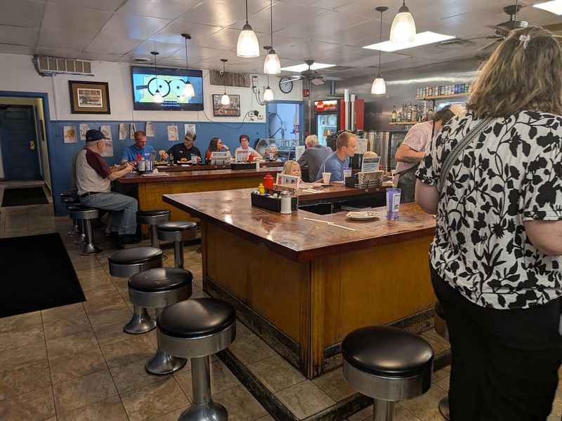 An Original Menu Still Hangs On The Wall Here
