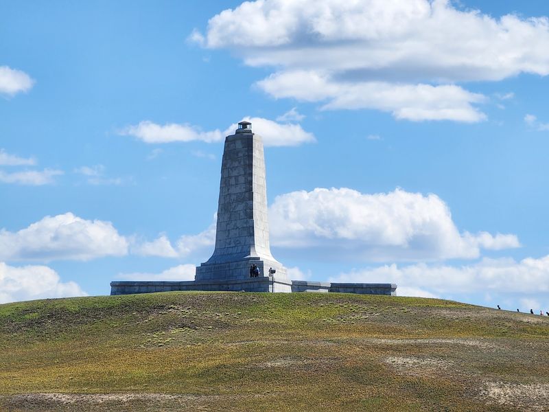 Climb The Dune For A Monument That Owns The Skyline