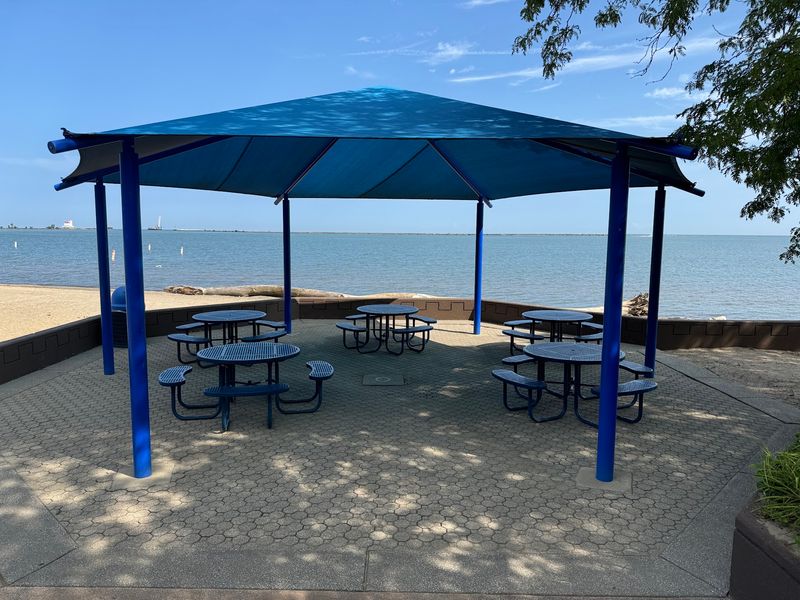 Snacks, Shade, And Picnic Tables With Lake Views