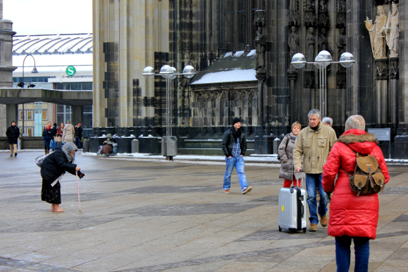 A Barefoot Beggar in front of the Dom (Photo: Jeff Rindskopf)