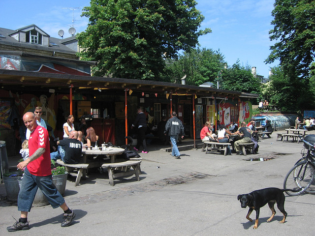 A busy cafe in summer in Christiania (Photo: Michael Bumann via Flickr)