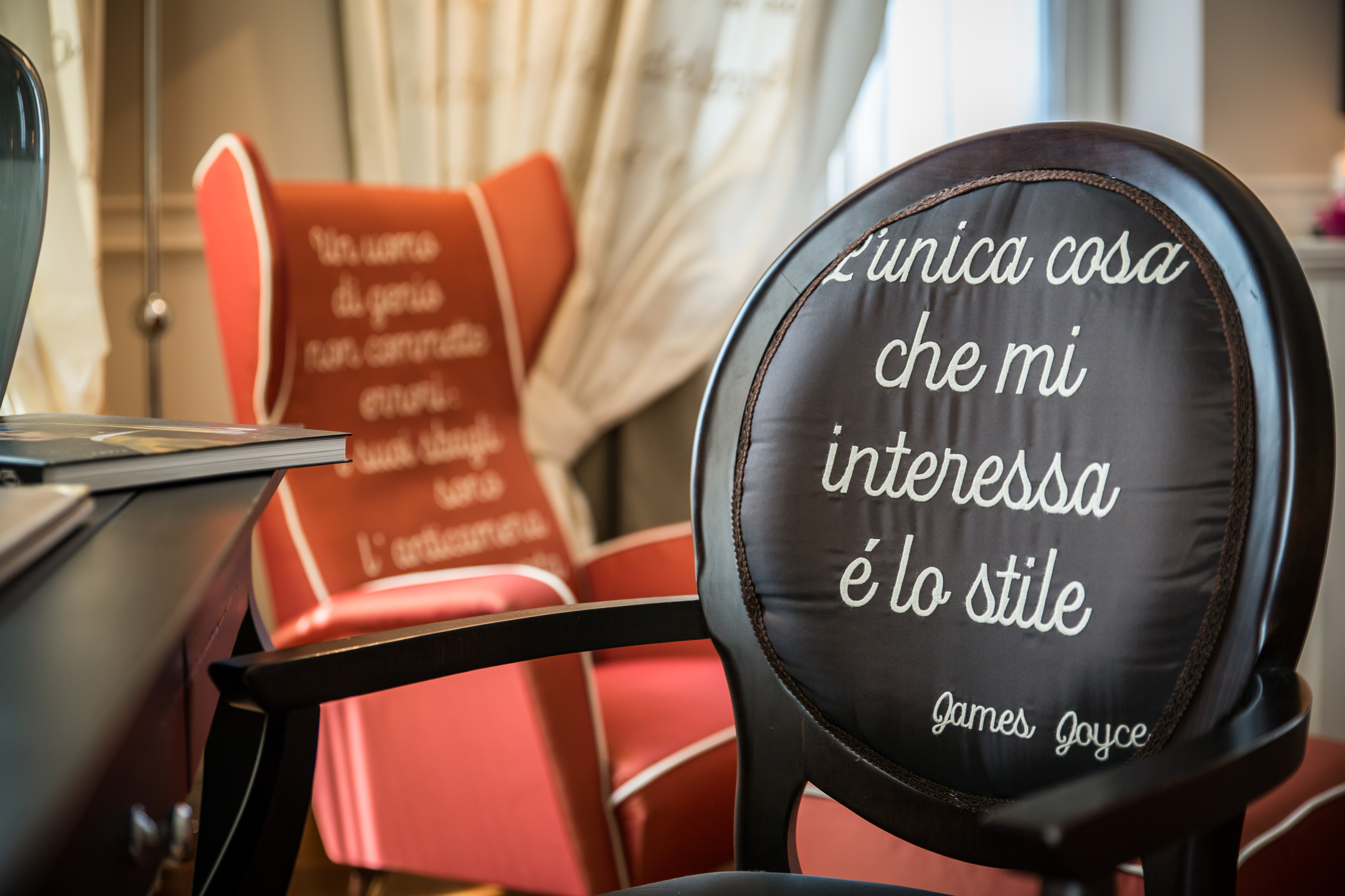 Elegant furnishings at Trieste's Victoria Hotel Letterario emblazoned with famous quotes from literary greats (Photo: Victoria Hotel Letterario)